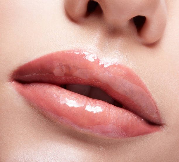 how to reduce swelling in lips after fillers